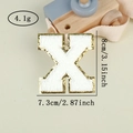 Detail of white chenille letter X patch with gold glitter edge and size dimensions - Letter X / White / Hot Melt Adhesive