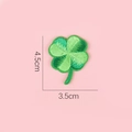 Green four-leaf clover embroidery patch measuring 4.5cm by 3.5cm for DIY decoration - Dark Green Clover