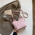 Pink shoulder bag with wavy texture, gold brand logo and knotted top handles - Pink Without Pendant