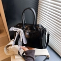Elegant black glossy handbag with silver lock and pearl bow charm in crossbody style - Black (With Charm)