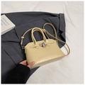 Elegant cream leather crossbody bag with metal lock and dual handles for women - Yellow
