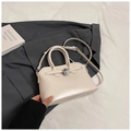 Elegant cream semi-circular handbag with metal lock and adjustable shoulder strap - Off White