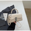 Detail of minimalist cream leather handbag with silver twist lock and round top handle - Off-white Without Pendant