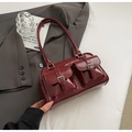 Dark red patent faux leather swan pillow bag with silver buckles and shoulder straps - Red