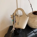 Cream bucket bag in lychee leather with silver buckle and cute decorative charms - With Pendant / Off White