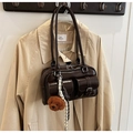 Dark brown glossy patent leather shoulder bag with twin front pockets and a teddy charm - With Pendant / Coffee
