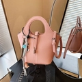 Pink lychee grain bucket bag with adjustable strap and cute decorative pendant charm - With Pendant / Pink