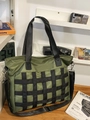 Durable large capacity olive green nylon tote bag featuring black webbing straps - Green