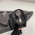 Glossy black bucket bag with silver turn-lock clasp and adjustable shoulder strap - Black without Pendant