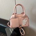 Borsa a bauletto rosa lucida con doppi manici e tracolla regolabile alla moda - Rosa