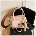 Pink patent leather handbag with cute puppy charm and adjustable crossbody shoulder strap - With Charm / Pink