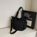 Sac fourre-tout noir en toile avec bandoulière réglable et poche latérale pratique - Noir
