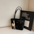 Chic black marble texture tote bag with gold hardware and plush bear charm accent - With Charm / Black