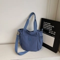 Sac fourre-tout bleu brume en nylon avec poches à cordon et bandoulière réglable - Bleu