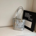 Silver-gray tote bag with floral embossed pattern and stylish wooden ring tassel detail - With Charm / Silver