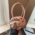 Borsa a tracolla rosa texture litchi con decorazione a fiocco e manico tondo - Rosa