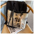 Détail du sac cabas en toile à fleurs avec bordure en cuir et porte-clé lapin mignon - Kaki Noir Avec Pendentif