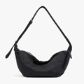 Minimalist black nylon crescent hobo bag with adjustable strap in flat lay view - Large / Black