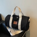 Grand sac de voyage en toile noire avec poignées rayées crème et bandoulière réglable - Noir