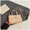 Elegant beige lychee texture bucket bag with silver twist lock and adjustable strap - No Pendant / Sakura Pink