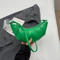 Glossy bright green crescent crossbody bag with quilted texture and slim strap - Green