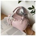 Pink PU bowling bag detail with pearl handle, lace bow, and checkered ribbon accents - Pink