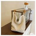 Beige hand-woven crochet tote bag with decorative wooden beads and fabric lining - Off White