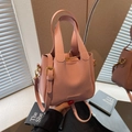 Pink lychee texture leather bucket bag with wide double handles and crossbody strap - Pink