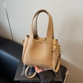 Beige lychee pattern leather bucket bag with top handles and gold-tone hardware - Khaki