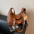 Brown vintage style tote bag with adjustable strap and plush bear pendant detail - Brown Large