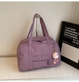 Large capacity purple canvas travel bag with side pockets and a cute plush charm accessory - With Charm / Purple