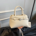Creamy white lychee grain leather bucket bag with top handle and crossbody strap - White