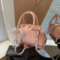 Pink Boston handbag with elegant pearl lace bow charm and adjustable shoulder strap - Pink