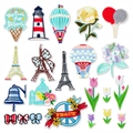 Bunte Stickpatches mit Tulpendesigns, Eiffelturm und Heißluftballons für DIY-Projekte - Bunte Serie Vielfalt