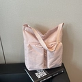 Pink lightweight nylon shoulder bag with double front pockets and wide fabric strap - Pink