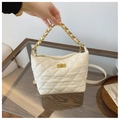 Chic beige quilted crossbody bag with golden chain strap and soft leather texture - Off-white