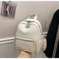 Vintage zachte lederen mini rugzak in crème beige met zilverkleurige hardware - Broken Wit