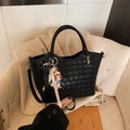 Black woven leather tote bag with round handles and a cute cartoon charm accessory - With Pendant / Black