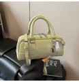 Detail of light green Boston bag with silver hardware and smooth leather finish - Light Green