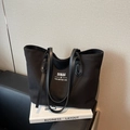 Grand sac cabas noir en toile avec anses en cuir et logo blanc pour un usage quotidien - Noir