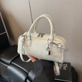 Chic white glossy Boston handbag with silver lock and adjustable shoulder strap - White
