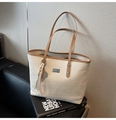 Minimalist beige woven tote bag with brown leather trim and metallic brand logo detail - With Pendant / White & Khaki Patchwork