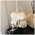 Detail of off-white lychee texture leather mini backpack with drawstring and twin pockets - White