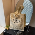 Beige woven straw tote bag with black Paris Milano embroidery in casual vacation style - Off-white