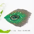 Parche bordado de pluma de pavo real con lentejuelas verdes y dorado, 10,6x6,9cm - Verde