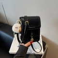 Chic black patent leather crossbody mobile phone bag with a cute white plush monster charm - With Charm / Black