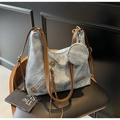 Blue denim tote bag with brown leather straps and a detachable round coin purse detail - Denim Blue