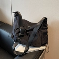 Black large capacity crossbody bag with wide nylon strap and buckle detail - Black