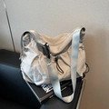 Light gray nylon crossbody dumpling bag with drawstring detail and adjustable wide strap - Gray