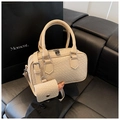 Detail of beige woven texture handbag with matching mini pouch and elegant leather handle - Khaki
